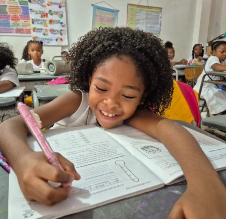 A child working in her Altruism Now activity book